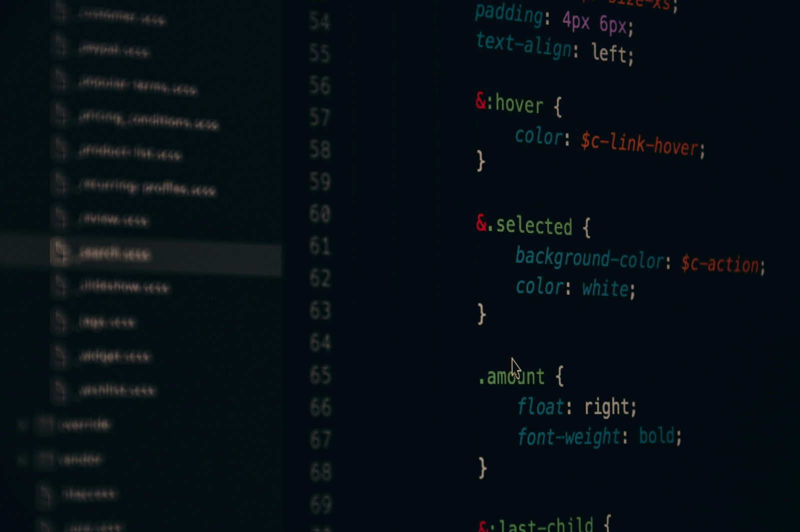 Home Close-up of colorful CSS code lines on a computer screen for web development.